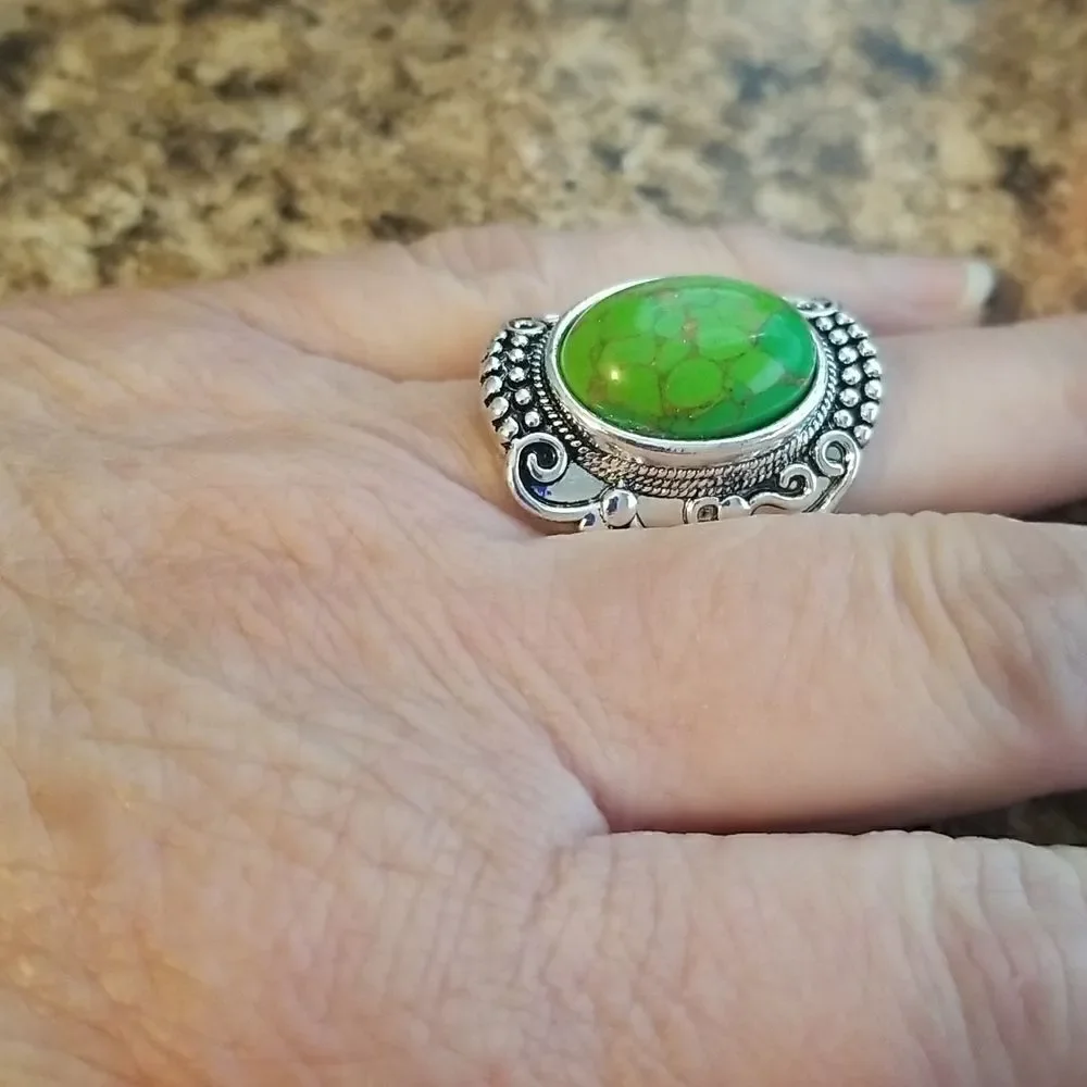 Inlaid turquoise egg shape carved ring size 8